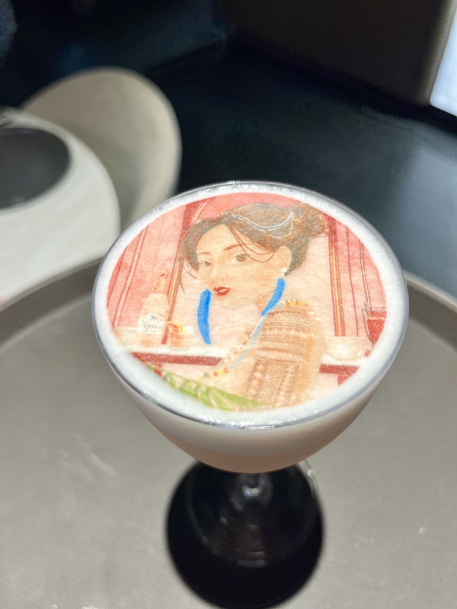 Start off your Mrs. Saldo's experience with the gin-based Pink Lady 550 cocktail that features a rice paper Mrs. Saldo's illustration