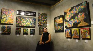 The artist with her works