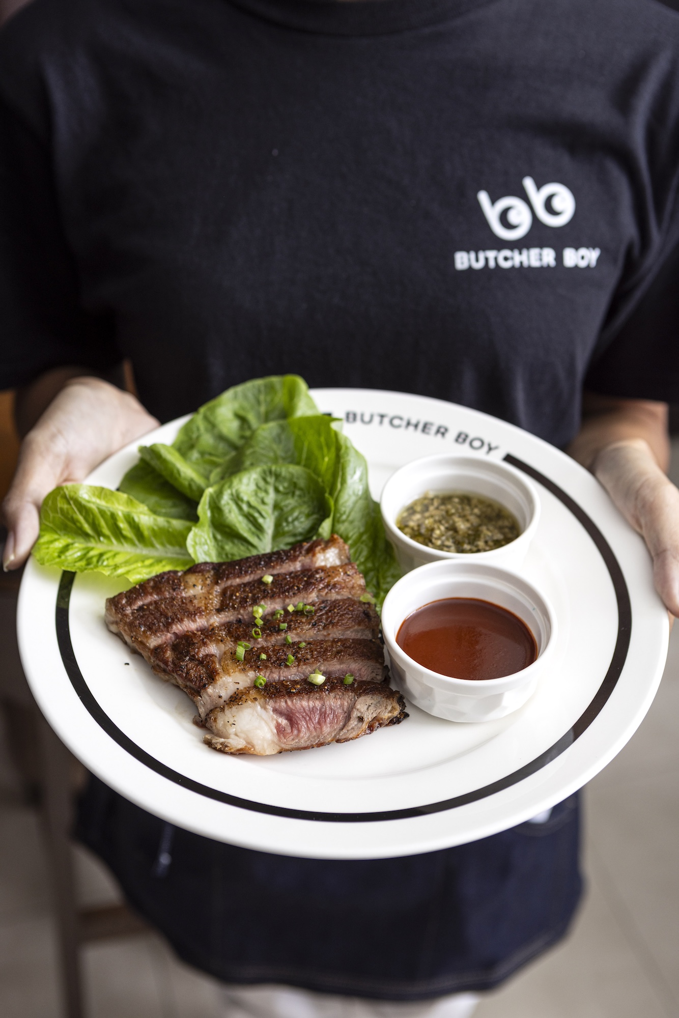 Beef bo ssam (beef ribeye, bo ssam sauce, scallion dressing, Japanese rice)