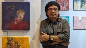 Eghai Roxas, artist and curator of the exhibit