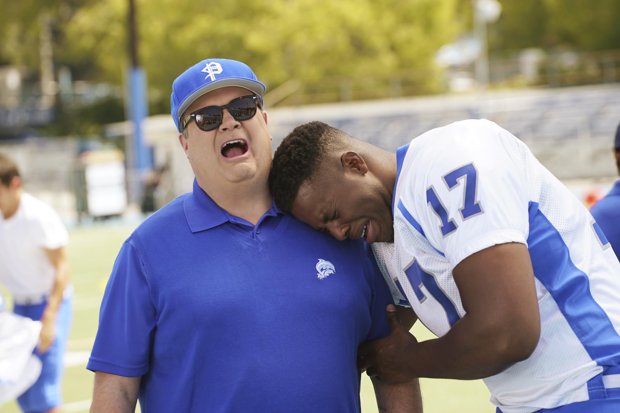 Eric Stonestreet and Winston Duke in Modern Family