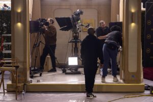 Technicians work on a TV set as technicians and workers add the last touches the day before the Golden Globes at Beverly Hilton in Beverly Hills, California, on January 4, 2025. (Photo by ETIENNE LAURENT / AFP)