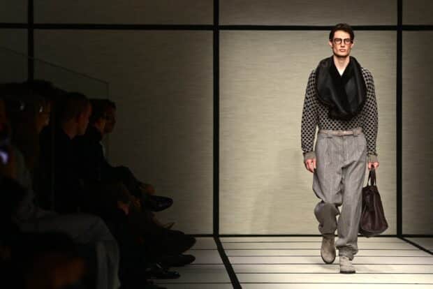 A model walks the runway during the Giorgio Armani collection show at Milan's Fashion Week Men's Fall / Winter 2025-2026 in Milan, Italy, on January 20, 2025. (Photo by Piero CRUCIATTI / AFP)