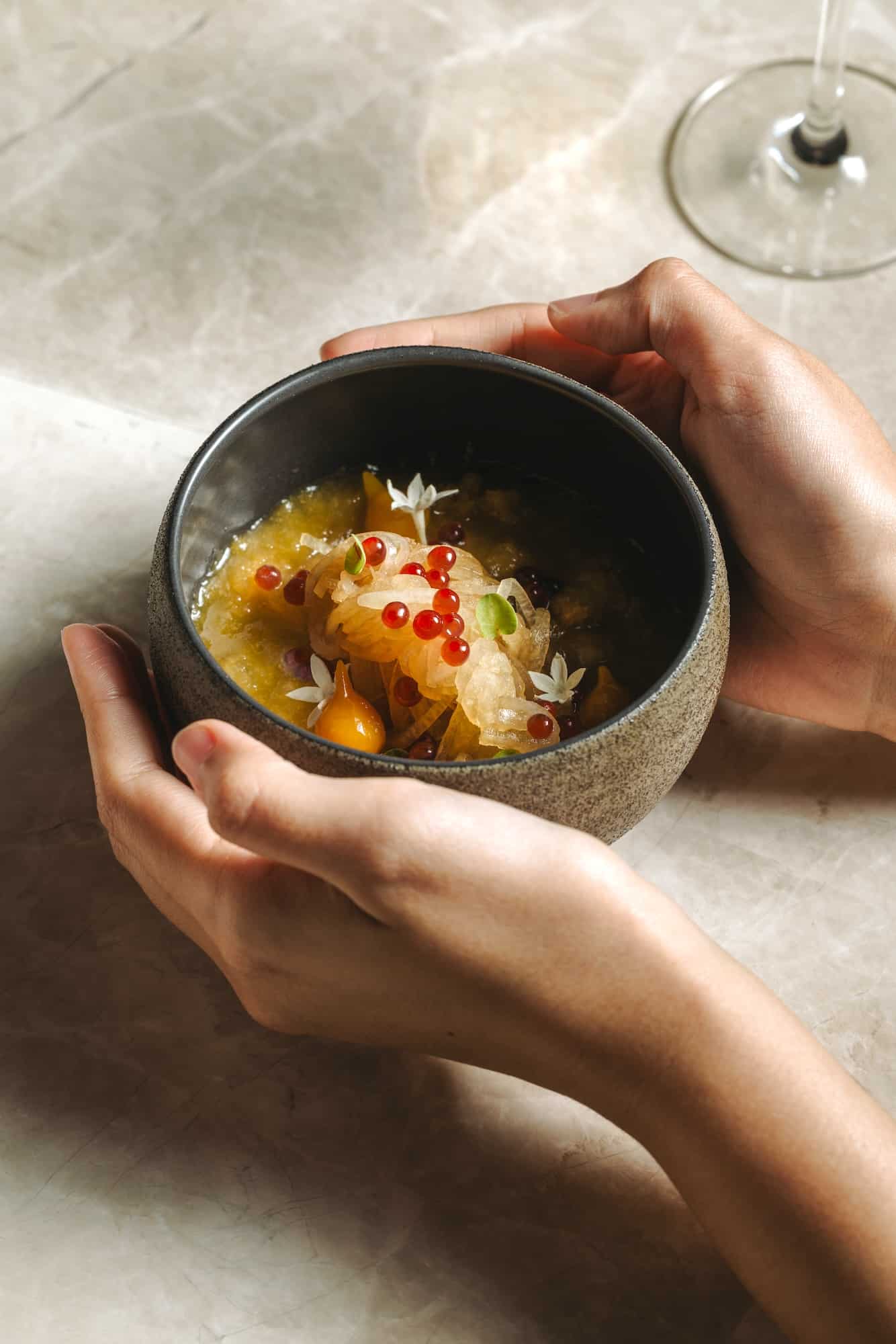 Winter melon salad (winter melon spaghetti, kaong, fragrant pear,onion butter, peach granita, salmon roe infused in gin)