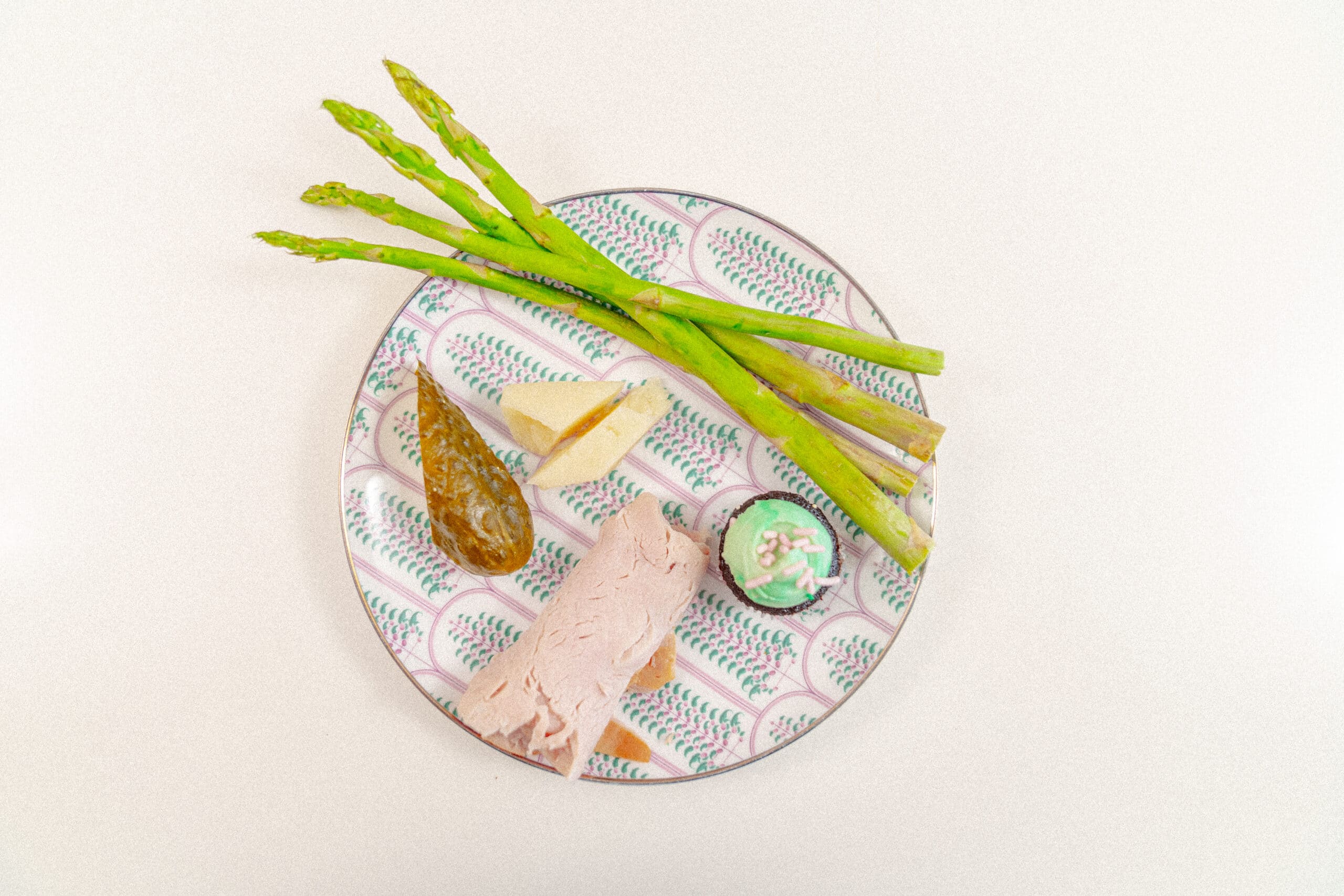 Smoked turkey breast, pickles, pecorino cheese, and a mini cupcake