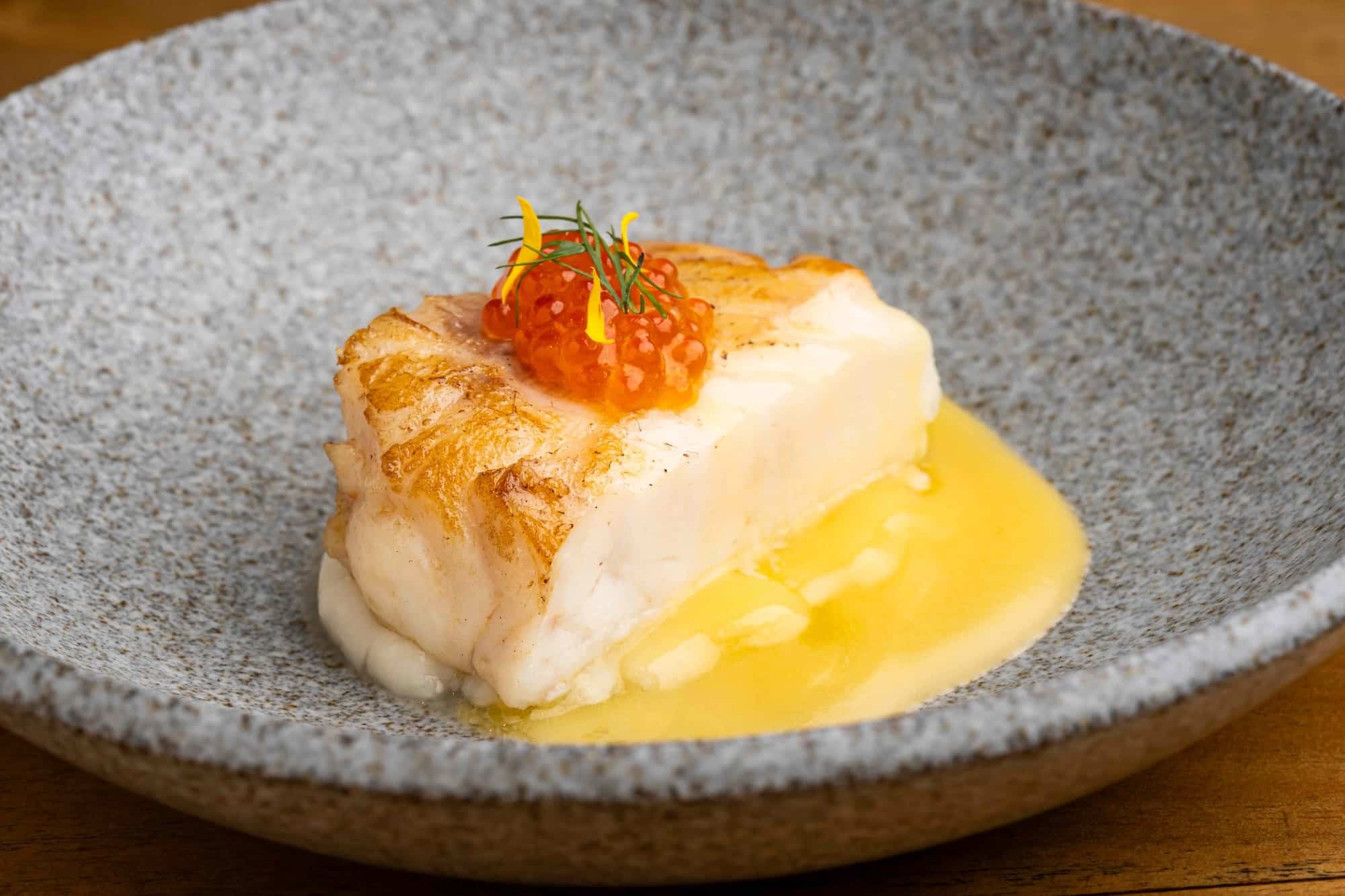 Pan-seared grouper in lemon beurre blanc