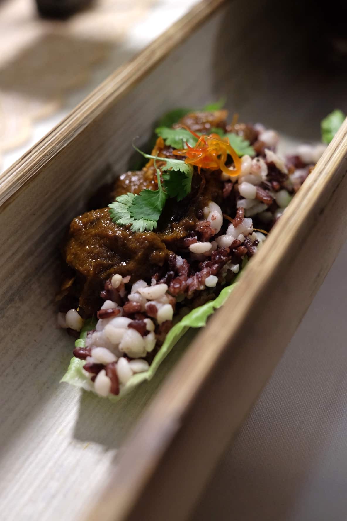 Mindanaoan beef cheek rendang, three-grain rice, shallots