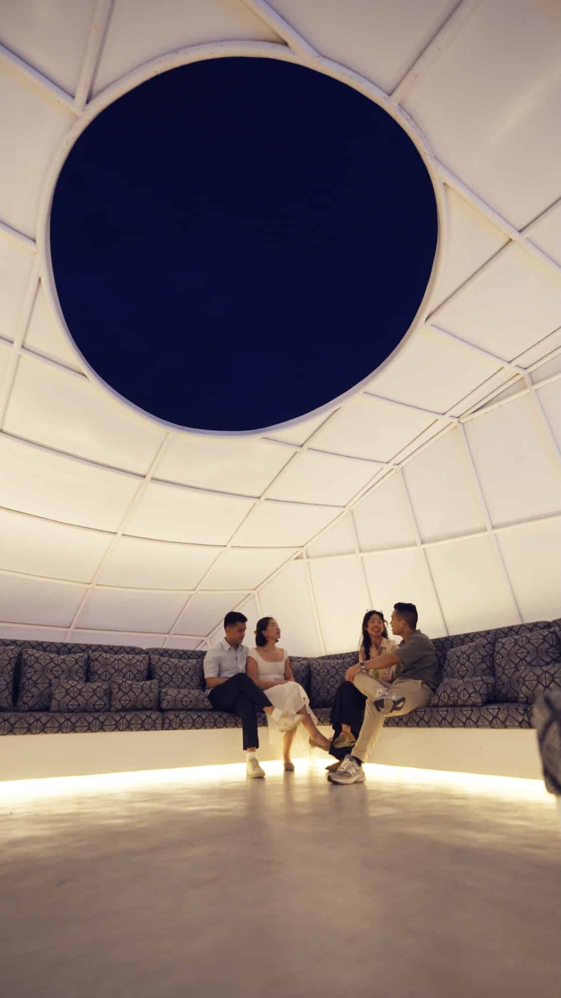 The second floor lounge anchored by a skylight in the middle of the steel dome