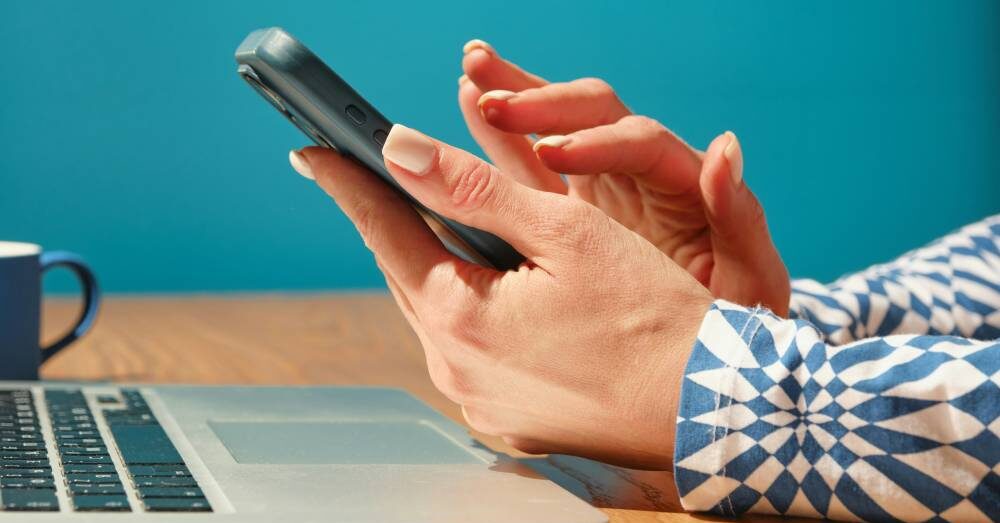 hand with phone